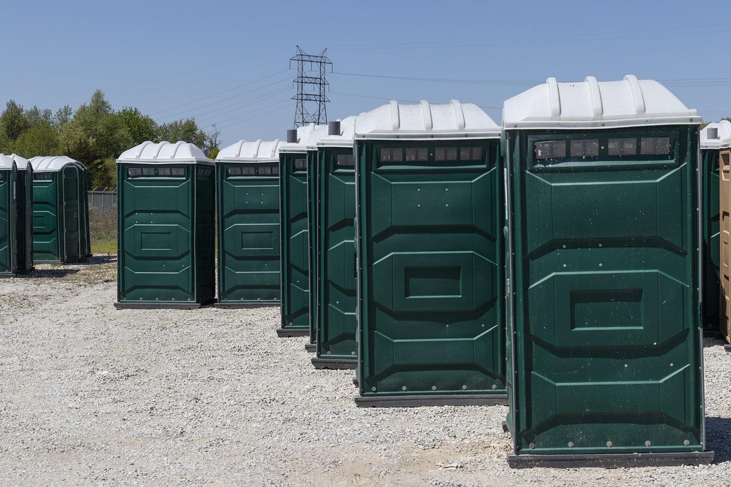 Clean portable restrooms staged for delivery